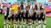 Germany players cover their mouths as a protest against FIFA (Mike Egerton/PA)