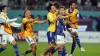 Japan players celebrate their 2-1 comeback victory over Germany in Group E of the World Cup (Mike Egerton/PA Images).