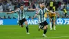 Lionel Messi, right, celebrates after firing Argentina into a first-half lead against Australia (Martin Rickett/PA)