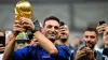 Argentina manager Lionel Scaloni celebrates with the World Cup trophy (Nick Potts/PA)