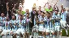 Lionel Messi lifts the World Cup trophy (Martin Rickett/PA)