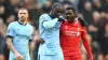 Kolo Toure (right) and brother Yaya (left) during their playing days at Liverpool and Manchester City respectively (Lynne Ca