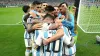 Lionel Messi, front, is embraced by his team-mates after setting up the third goal for Julian Alvarez (Nick Potts/PA)