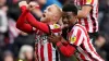 Sunderland’s Alex Pritchard (left) celebrates with Amad Diallo (Owen Humphreys/PA)