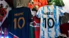 A France and Argentina shirt hang in a market stall in the Souq area of Doha