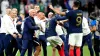 Didier Deschamps (centre) celebrates at full-time after France’s victory (Nick Potts/PA)