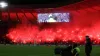 Celtic fans set off flares in the stands before the Viaplay Cup semi-final (PA)