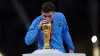 Julian Alvarez kisses the World Cup trophy (Mike Egerton/PA)