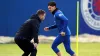 Rangers’ Ianis Hagi with manager Michael Beale during a training session (Andrew Milligan/PA)