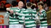 Celtic’s Aaron Mooy is congratulated after sealing a 2-0 win over Dundee United