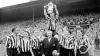 Newcastle captain Jimmy Scoular lifts the 1955 FA Cup