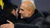 Manchester City manager Pep Guardiola, right, embraces Arsenal boss Mikel Arteta (Mike Egerton/PA)