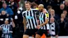 Dan Burn, left, celebrates with fellow goalscorer Joelinton (Owen Humphreys/PA)