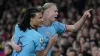 Nathan Ake celebrates with Manchester City team-mate Erling Haaland 