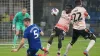 Mark McGuinness escaped with a yellow card for this foul on Amadou Mbengue 