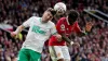 Newcastle’s Fabian Schar battles with Manchester United’s Fred 