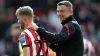 Sheffield United manager Paul Heckingbottom congratulates Tommy Doyle