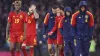 Spain players walk off dejected following their defeat at Hampden 