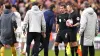 Julen Lopetegui, centre left, speaks to referee Michael Salisbury