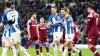 Brighton’s Joel Veltman (centre) 