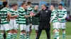 Ange Potsecoglou congratulates his Celtic players (Jane Barlow/PA)