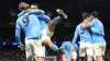 Erling Haaland, left, celebrates his goal with fellow scorer Bernardo Silva (Tim Goode/PA)