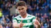 Celtic’s Matt O’Riley celebrates his team’s third goal at Rugby Park (Jane Barlow/PA)