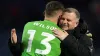 Coventry City manager Mark Robins greets goalscoring goalkeeper Ben Wilson (Martin Rickett/PA)