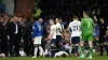 Tottenham Hotspur’s Harry Kane lays on the floor 