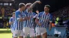 Matty Pearson (centre) scored Huddersfield’s second goal in the win at Watford