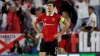 Harry Maguire looks dejected during the Europa League defeat to Sevilla (Isabel Infantes/PA)