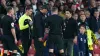 Match referee Michael Oliver (centre) speaks to Liverpool manager Jurgen Klopp and Arsenal manager Mikel Arteta