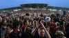 Wrexham fans celebrated promotion with a pitch invasion (Martin Rickett/PA)