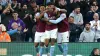 Tyrone Mings (centre) celebrates scoring Aston Villa’s winner against Fulham (Martin Rickett/PA)