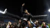 Burnley players lift manager Vincent Kompany after winning the Sky Bet Championship following the Sky Bet Championship match