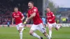 Wrexham’s Paul Mullin (centre) celebrates scoring their second goal in their 3-1 victory over Boreham Wood (Martin Rickett/P