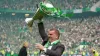 Ange Postecoglou celebrates with the league trophy (Andrew Milligan/PA)