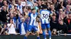 Brighton’s Julio Enciso (left) celebrates after opening the scoring at Arsenal 