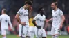 Leeds players show their dejection at Bournemouth on Sunday after slipping to another heavy Premier League defeat (Steven Pa