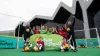 Kenny Miller, right, attends an event to promote the re-opening of McDonald’s Fun Football centres at the Riverside Museum, 