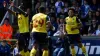 Shola Shoretire, right, celebrates his goal (Steven Paston/PA)