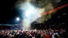 Luton fans celebrate on the pitch after victory over Sunderland 