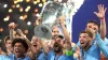 Manchester City’s Ilkay Gundogan lifts the Champions League trophy (Martin Rickett/PA)