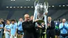 Pep Guardiola lifts the Champions League trophy (Martin Rickett/PA)