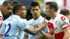 Joey Barton (right) was initially sent off for clashing with Manchester City’s Carlo Tevez (Peter Byrne/PA)