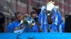 Manchester City’s Bernardo Silva lifts the Premier League trophy during the parade (Peter Byrne/PA)