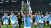 Manchester City’s Kevin De Bruyne lifts the Champions League trophy (Martin Rickett/PA).