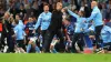 Manchester City manager Pep Guardiola and players celebrate winning the Champions League final (Martin Rickett/PA)