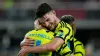 Arsenal midfielder Declan Rice, right, hugs team-mate Gabriel Martinelli (Alex Brandon/AP)