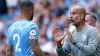 Manchester City manager Pep Guardiola (right) has pledged to fight to keep defender Kyle Walker (Zac Goodwin/PA)